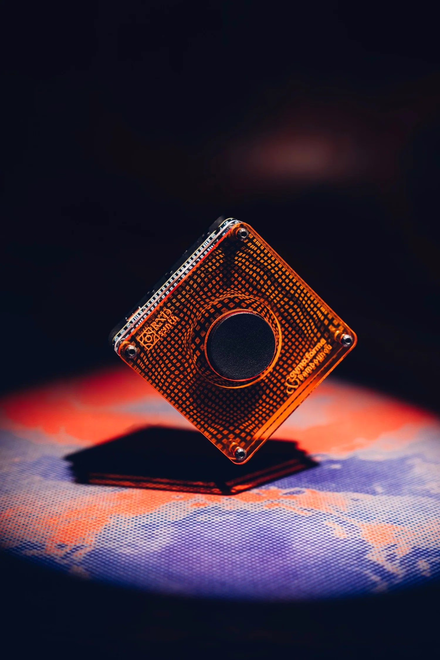 The Cyma Forma RND and its single random-generation button, backlit