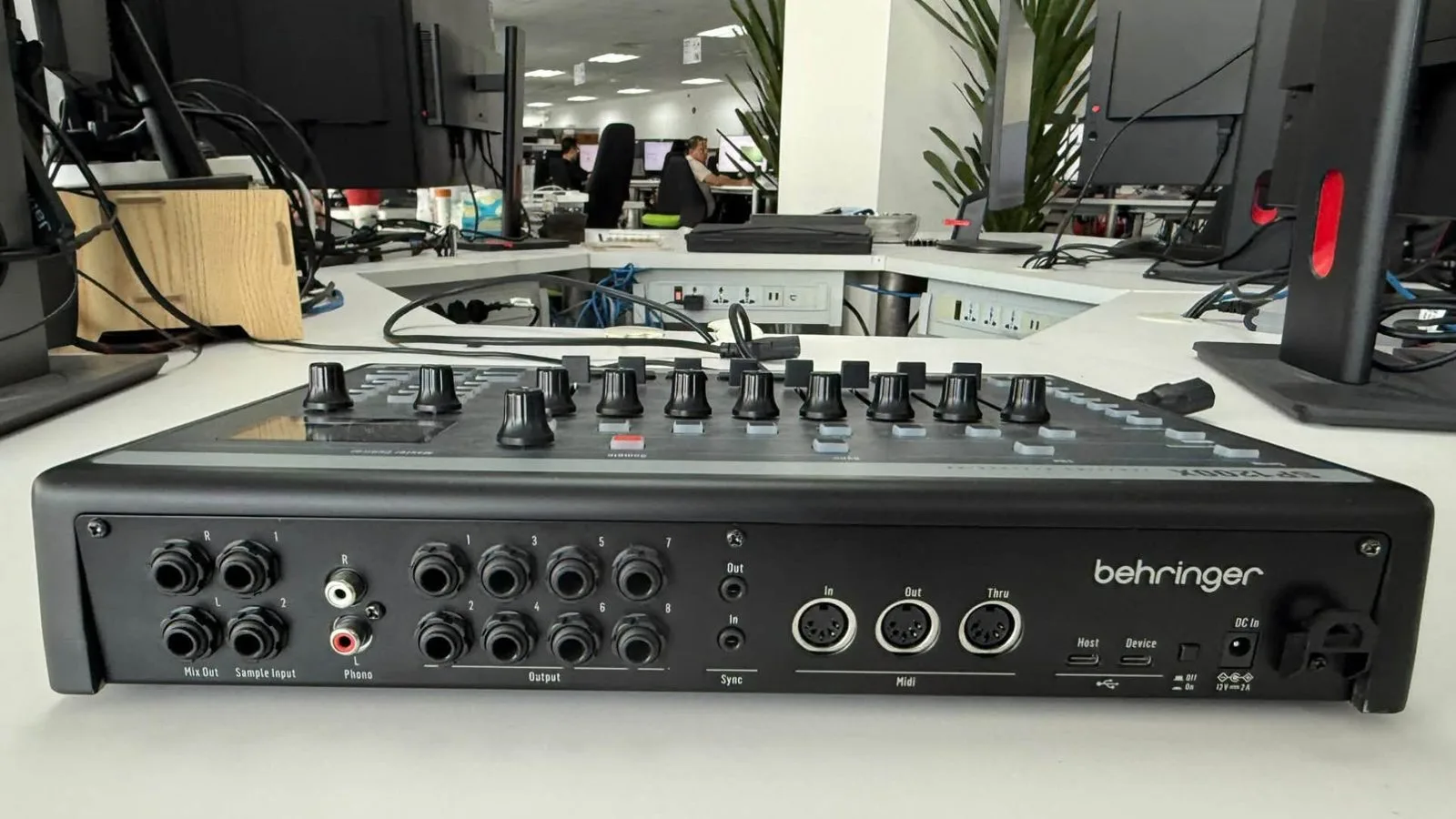 The rear panel of the Behringer SP1200X with eight individual outputs and MIDI